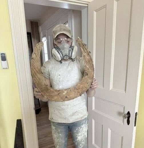 This was found in the ceiling of our upstairs bathroom (the round thing not our contractor) which is being insulated and drywalled. Any idea what it is? Cloth with a pliable wooden dowel? Moves easily. Our house was built in 1854 via Francesca Smith Check the comments ⬇