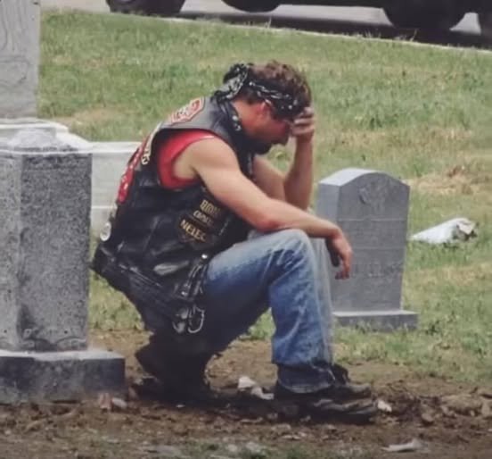 A mysterious biker visited my late wife’s grave every Saturday at exactly 2 PM, sitting silently by her headstone for an hour before disappearing again. For months I watched, confused and angry, until the truth behind his quiet devotion shattered everything I thought I knew about her life.